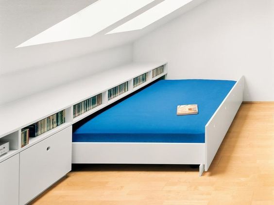 Create a Guest Bedroom in the Attic with Storage Space and Pull out Bed. 