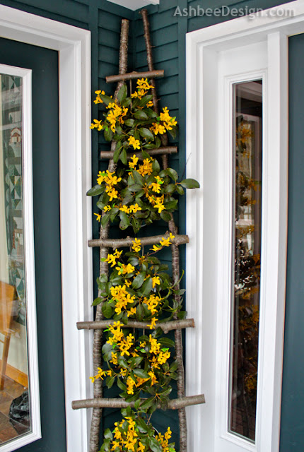 Decorate the Front Porch with DIY Birch Ladder. 