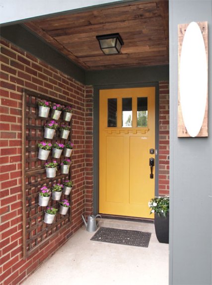 Decorate the Front Porch with This DIY Vertical Wall Planter. 