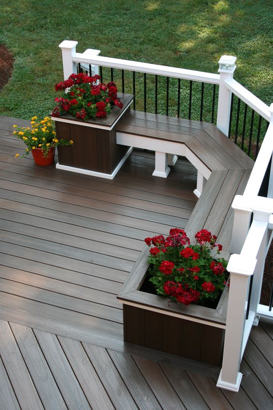 Add a Deck Bench with Potted Plants for a Relaxing Place to Sit. 