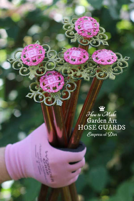 DIY Garden Art Hose Guards Made from Kitchen Drawer Pulls. 