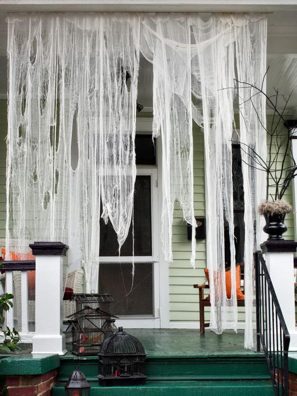 Spooktacular Front Porch With Drape Cheesecloth. 