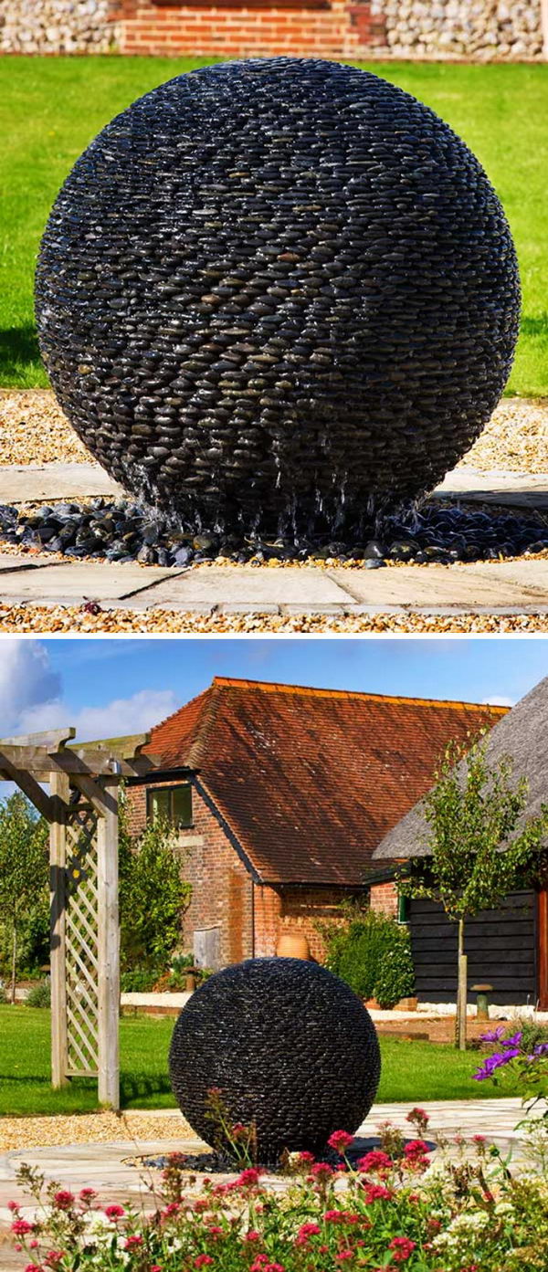 Dark Planet Fountain Made From Hundreds Of Black Puddle Stones. 