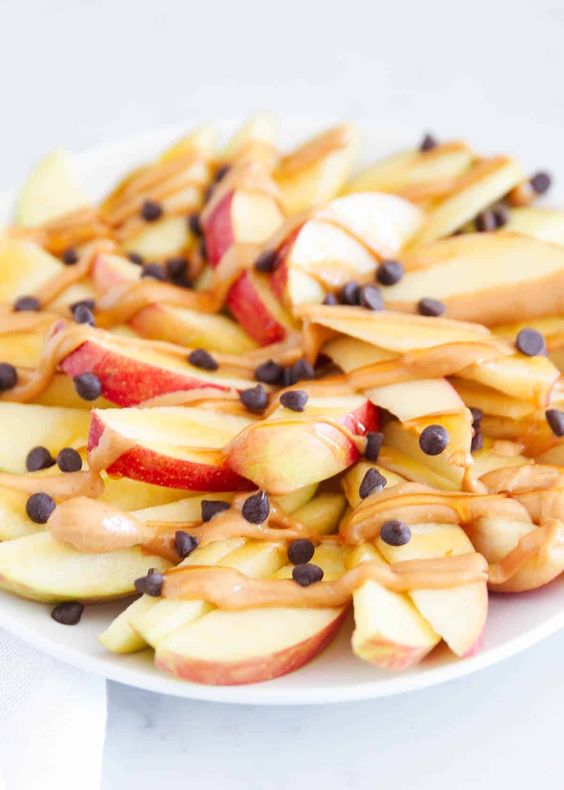 Apple Slices with Peanut Butter for Snack. 