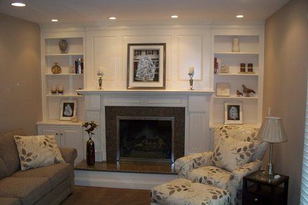 Fireplace Surround With Shelving And Cabinets. 