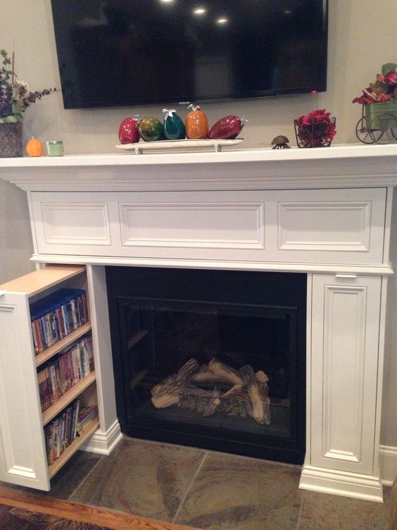 DVD Storage In Fireplace Surround. 