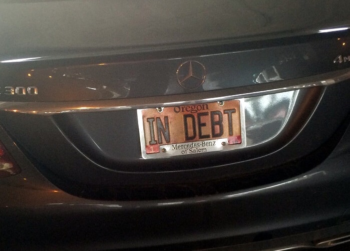 In Debt. 