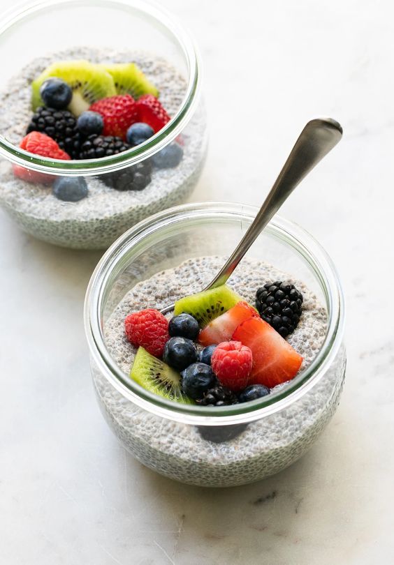 Chia pudding made with almond milk, topped with berries and nuts. 