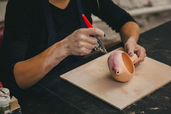 Airbrushing Underglaze onto Pottery. 