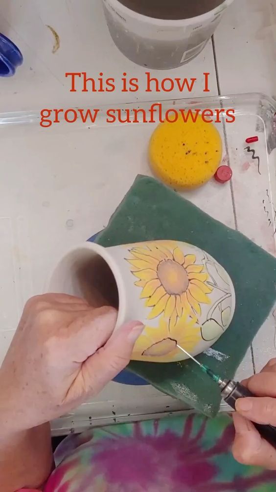 Underglaze Paint Sunflowers on Pottery. 