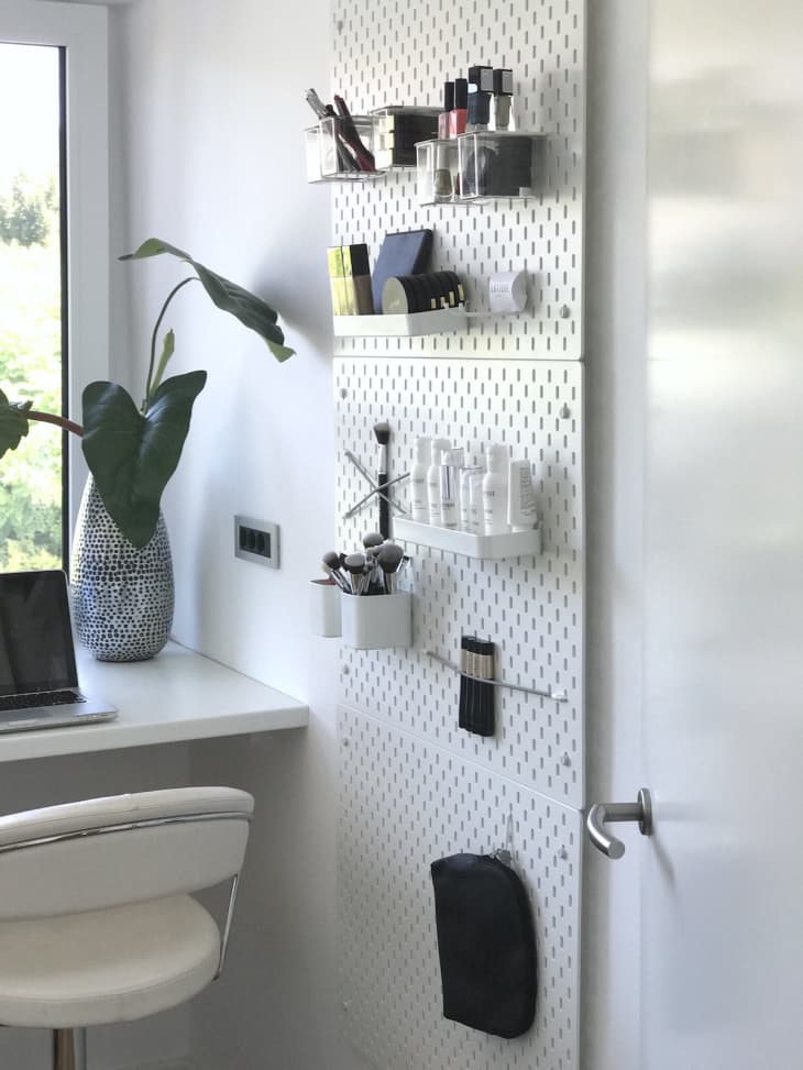 Floor-to-Ceiling Pegboards for Large Living Room Wall. 