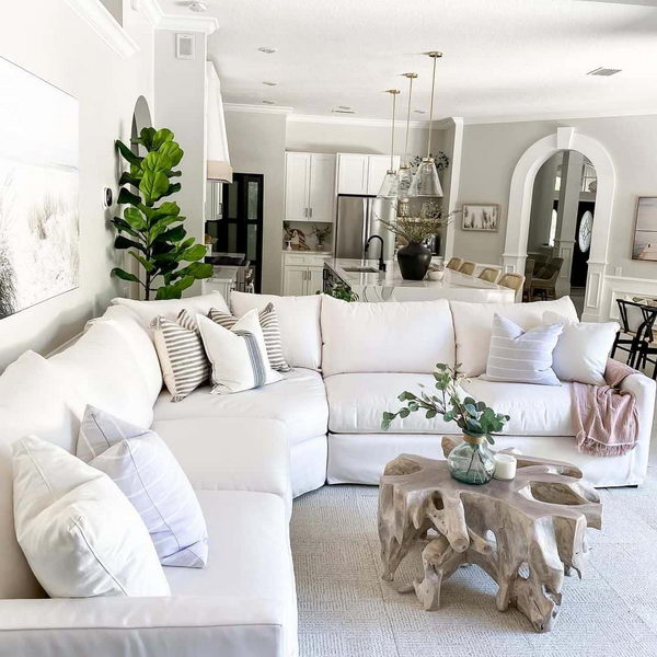 Arched Doorway into Open Living Room. 