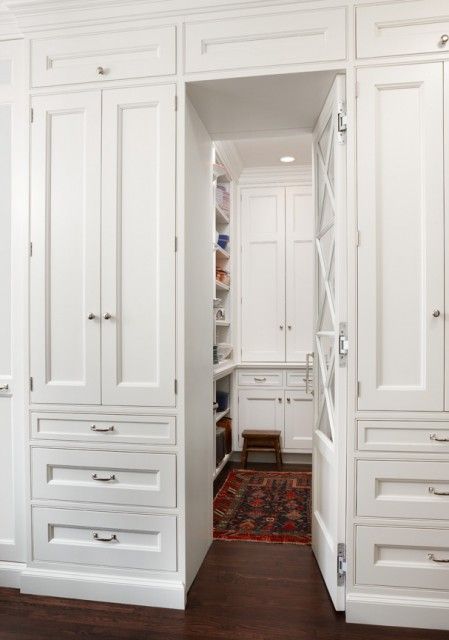 Hidden Pantry With White Floor To Ceiling Kitchen Cabinets. 