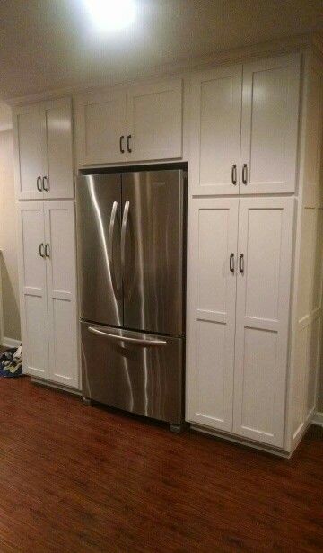 Maximize Your Pantry Storage with Cabinet Depth Fridge and Surrounding Cabinets. 